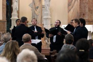 Woods Vocal Ensemble singing at a concert